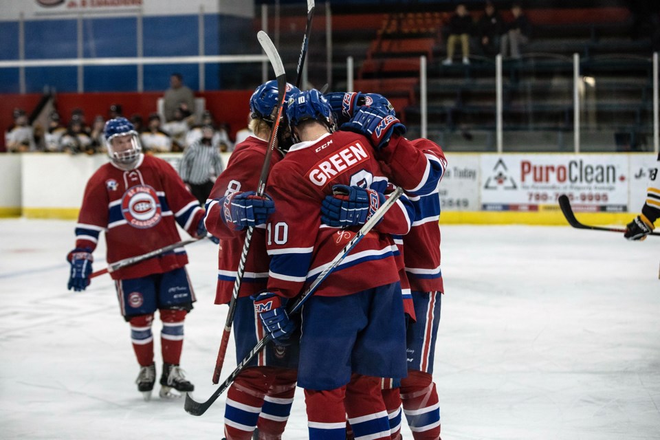 The Canadiens celebrate one of their first goals of the night on Oct. 30, at the Clancy Richard Arena. Janice Huser photo.