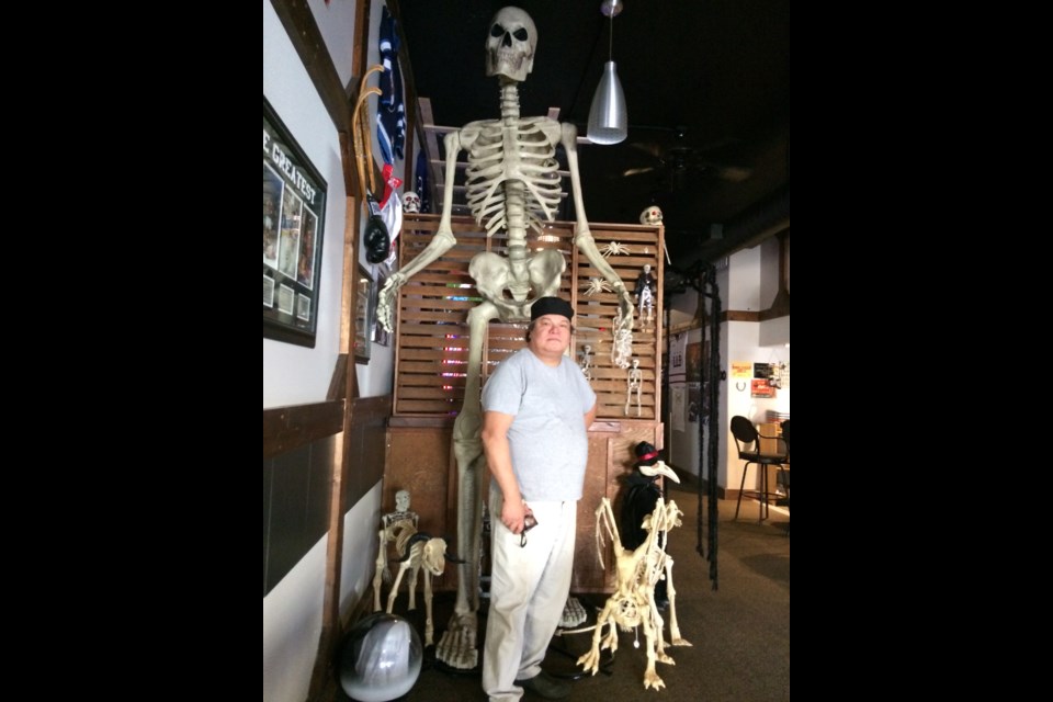 Lac La Biche's Labone's Kitchen & Bar owner Brian Laboucane (pictured middle: with the grey shirt on)  has turned up the scary at his downtown Lac La Biche eatery.    Image Rob McKinley
