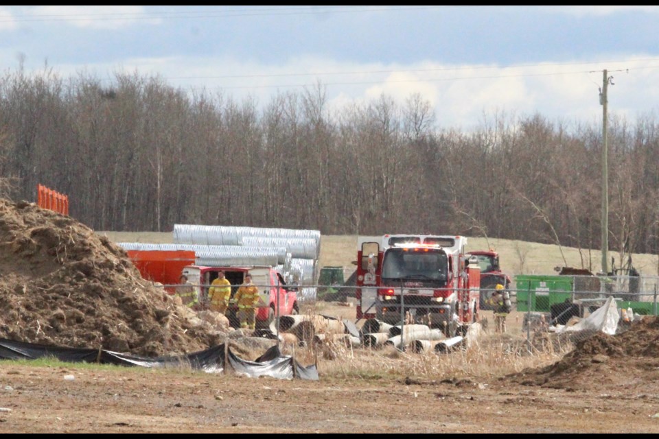 Lac La Biche Fire Services crews finish the mop-up of a small blaze that sparked inside a Lac La Biche County storage compound at the County Centre last Saturday.