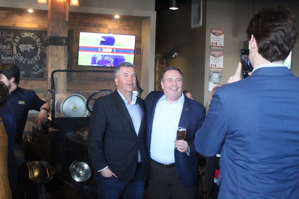 Lac La Biche business owner Peter Mahowich stands with Alberta Premier Jason Kenney for a photo during Thursday's meet and greet.