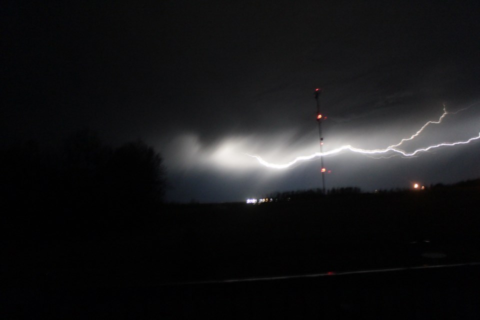 It was a pretty good light show across the Lakeland last night and into Tuesday morning.  Here's a bolt arching near a cell tower just east of the Lac La Biche Ramada. Despite the storm and rain, temperatures remained in the low 20s overnight, with Tuesday's high forecast to hit 31 under a Hot Weather Advisory from Environment Canada.  For more weather details, visit us at https://www.lakelandtoday.ca/weather.