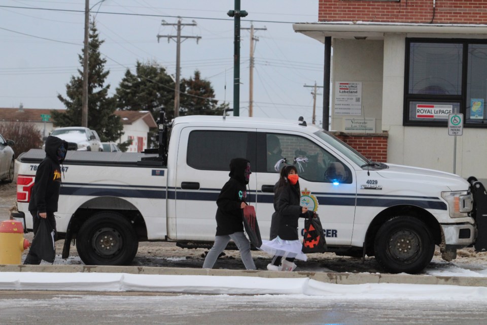 Peace Officers and RCMP were doing patrols and handing out treats on Lac La Biche streets last year. They will be out this year too.