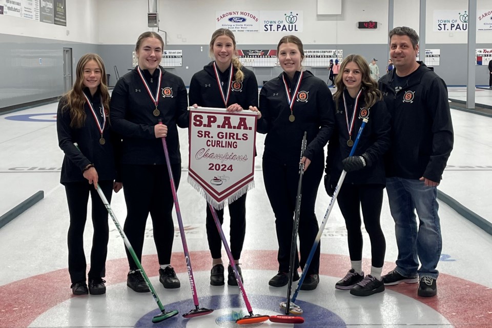 Ava Corriveau, Katelyn Pawlyk, Kaitlyn Foote, Courtney Werstiuk, Chloe Jean, and coach Adrien Jean make up this year’s winning SPAA curling team in the girls’ category. The team will compete at NEASAA zones this month. 
