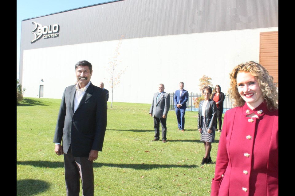 Then and now: A file photo from 2018 of then Minister of Infrastructure Prasad Panda and former Fort McMurray-Lac La Biche MLA Laila Goodridge with County councillors at the site of the proposed new aquatic centre. At that time, the budget was $15 million with the province contributing $5 million.    The price tag now sits at $46 million.
   File - Image Rob McKinley