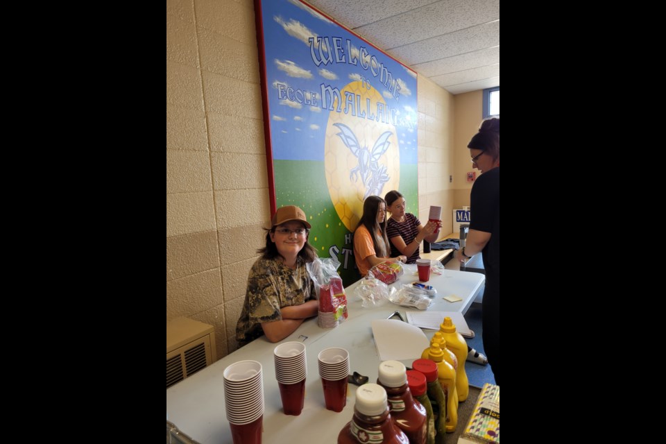 In an effort to make a difference for those affected by wildfires across the province, Grade 8 and 9 students from Mallaig School organized a hot dog and ice cream float fundraiser sale on June 14.