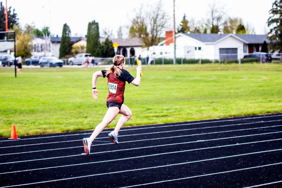 The relay race is among the variety of sports played during the annual St. Paul Athletics Association (SPAA) senior high track and field championship at the St. Paul Regional High School track on May 22.