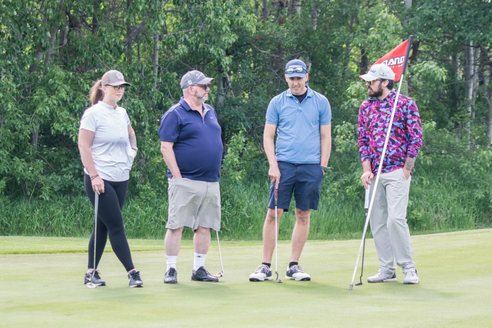 Staff from the St. Paul RCMP Detachment participate in the Chamber of Commerce golf tournament. 