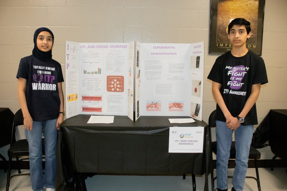 Daniyah Abdul Wadood (left) and Dawood Mohammed, from St. Paul, worked on a project to raise awareness about ITP.