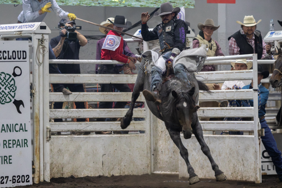 Matt Beatty from Chauvin compete at bareback riding during the first performance of the LRA Finals at the Clancy Richard Arena on Aug. 28.