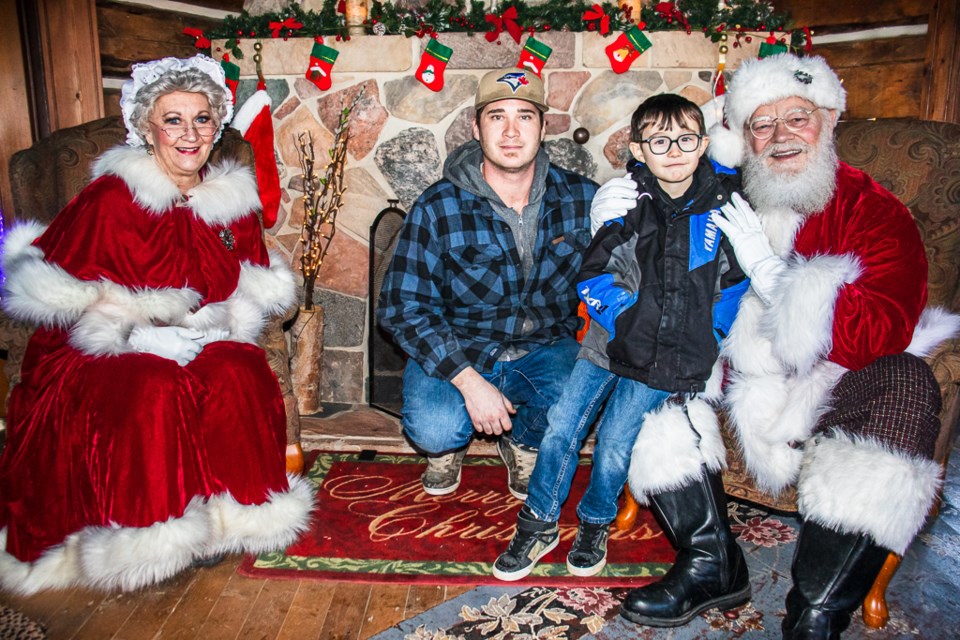 Santa and Mrs. Claus greet families and children on Dec. 16 during their visit at the St. Paul Museum.