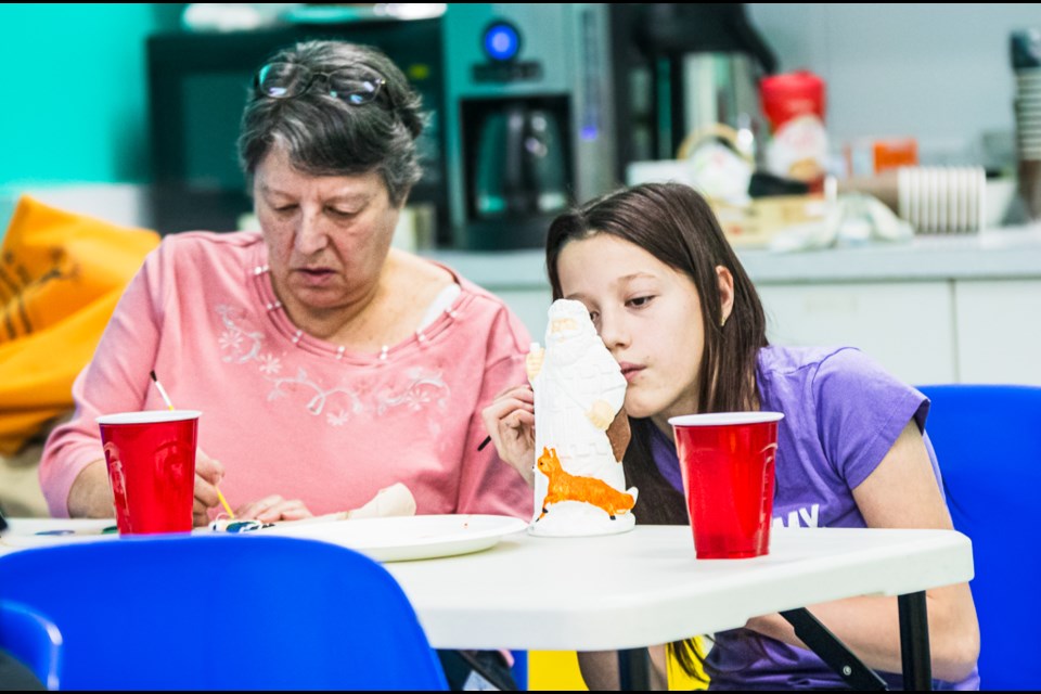 Yvette Kievenky (left) and her granddaughter Liz bond over creating art.