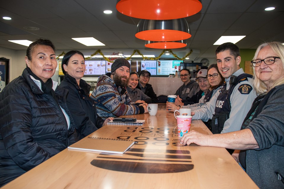Three members of the St. Paul RCMP detachment, including a non-uniformed officer as well as Sgt. Bobby Burgess (second from the right), operations NCO for the Town/County of the St. Paul RCMP, is pictured with members of the community and A&W staff.