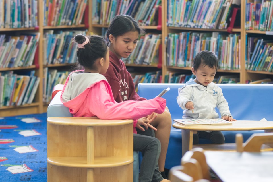 Throughout the day, members of the community cycled in and out of the St. Paul Municipal Library to collect free comic books or just to hang out.