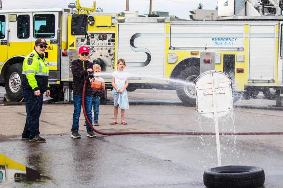 There was plenty of fun to be had during the open house, including shooting down a target with a water hose.