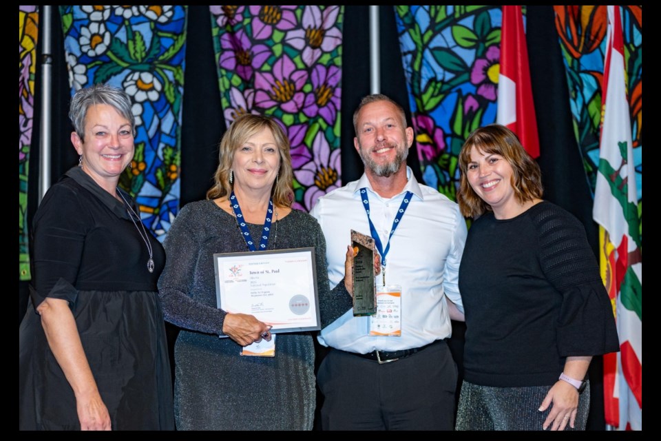 From left to right are Colleen Stockford, Edna Gervais, Brian Nixon, and Christine Isaac at the 30th Edition of the Communities in Bloom National & International Awards Ceremonies at Charlottestown in Prince Edward Island. Stockford and Isaac were evaluated the Town of St. Paul during the CiB competition.