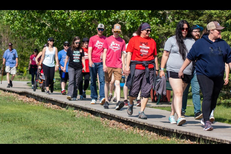 Members of the community make the trek starting at Lagasse Park during the 2023 St. Paul Jayman BUILT MS Walk on May 28.