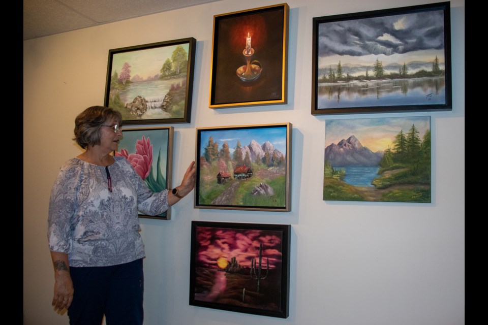 Julie Jolie shows her earlier oil paintings.