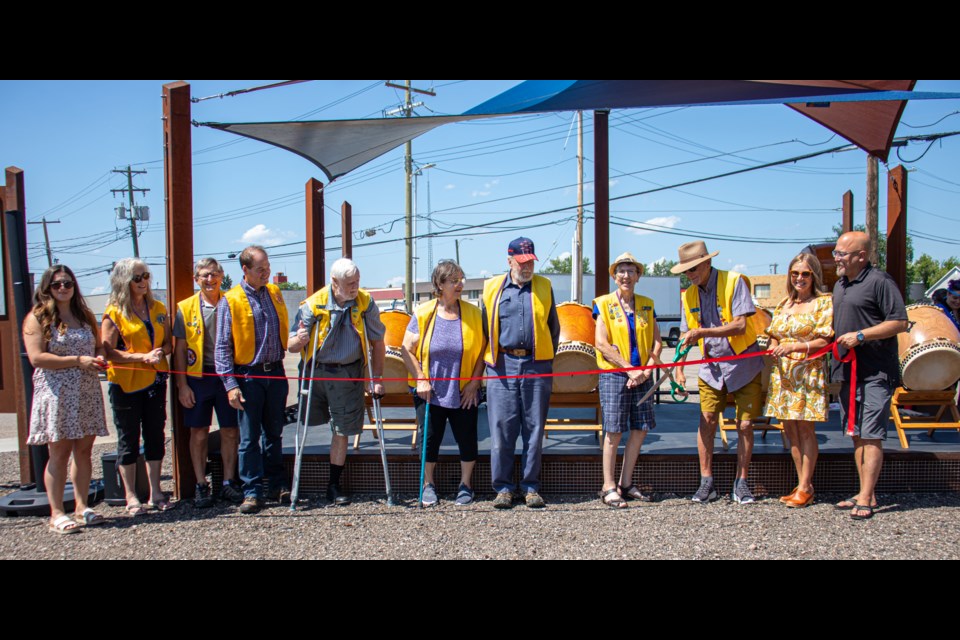 St Paul & District Lions Club cuts the ribbon during a ceremony on June 24 in honour of the Lions Park in downtown St. Paul.