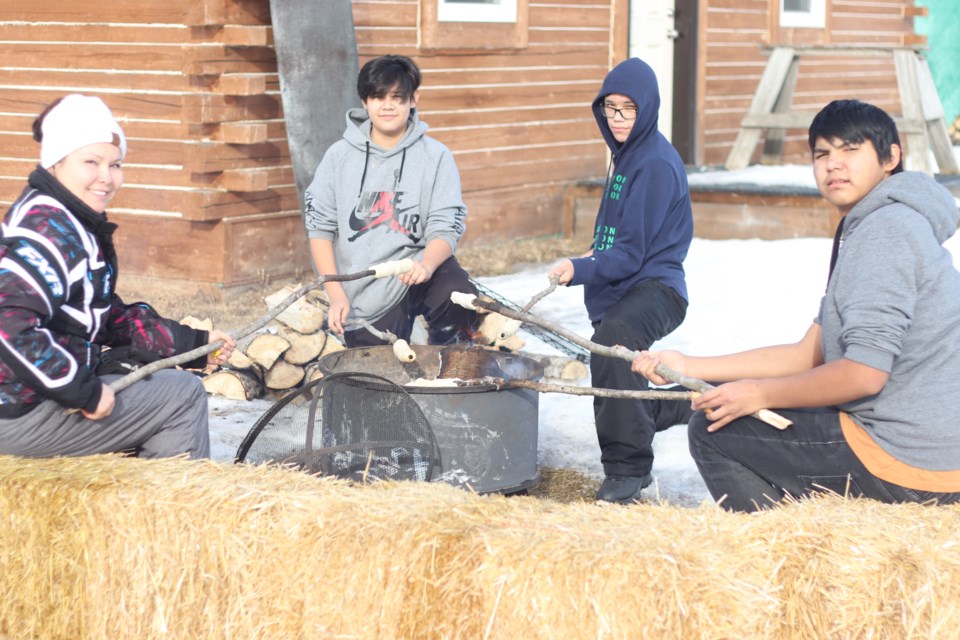 On the final day of the Tribal Chiefs Education Foundation’s three-day land-based education winter camp on Feb. 9, held at Pakan Elementary and Junior High School in Whitefish Lake First Nation #128, students had the opportunity to learn about Indigenous traditions, which include cooking bannock.