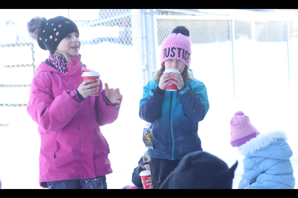 Children warm up with hot chocolate at the St. Paul Museum on Feb. 17 during Shiver Fest activities, ahead of the Family Day long weekend.