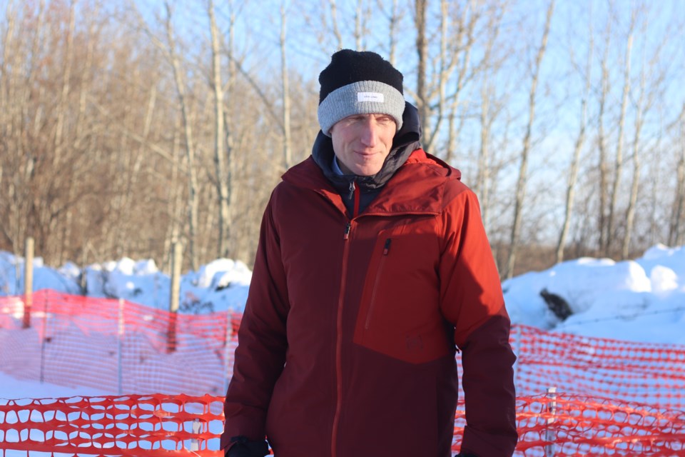 Federal Minister Marc Miller is pictured during his visit to the site of a mass grave located at the Sacred Heart cemetery grounds.