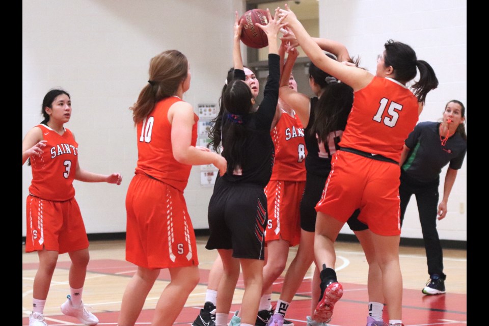 The Ashmont Falcons girls' team took on the St. Paul Regional High School Saints during the semi-finals of the St. Paul Athletic Association (SPAA) playoffs on March 1. The Falcons won the game and will play against Glendon on Monday for the SPAA championship.