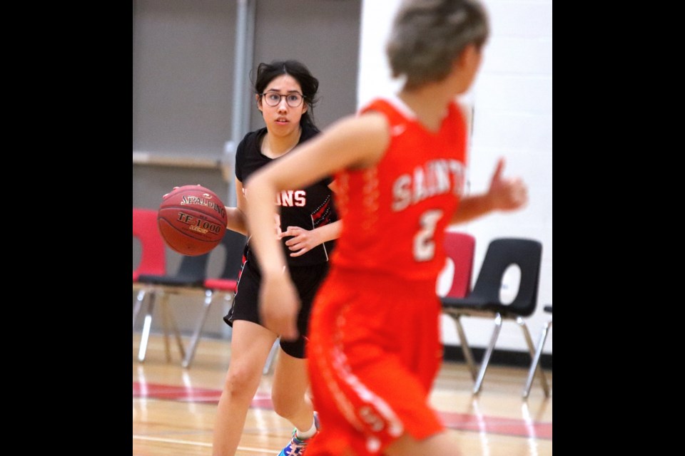 The Ashmont Falcons girls' team took on the St. Paul Regional High School Saints during the semi-finals of the St. Paul Athletic Association (SPAA) playoffs on March 1. The Falcons won the game and will play against Glendon on Monday for the SPAA championship.