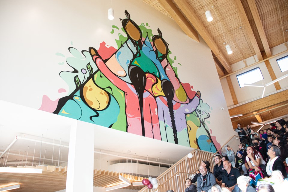 In 2023, Wade Stamp worked on a mural at the new Onchaminahos Elementary School in Saddle Lake. 