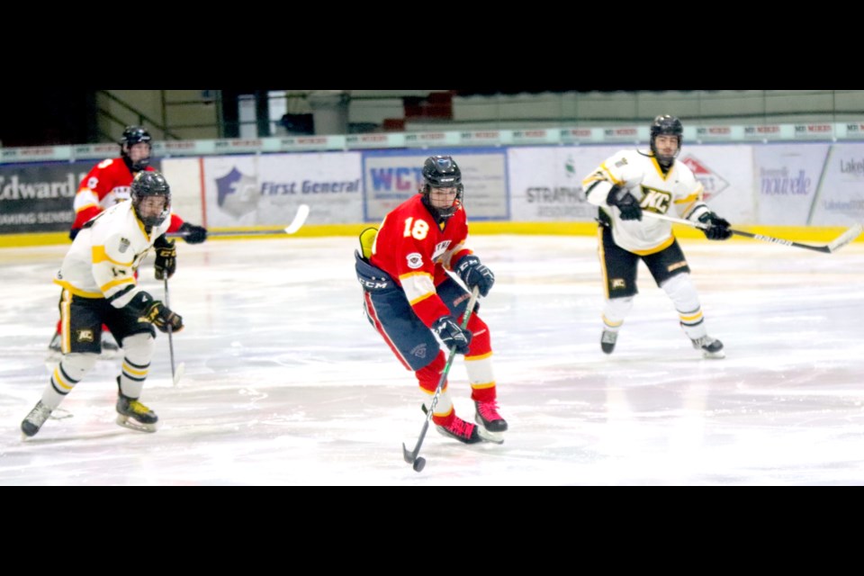 Pictured middle is forward Atley Chachula under pursuit.