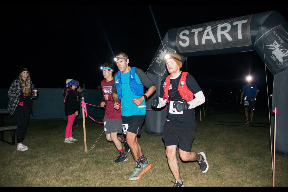 Solo runners complete the race as family and friends welcome them back.