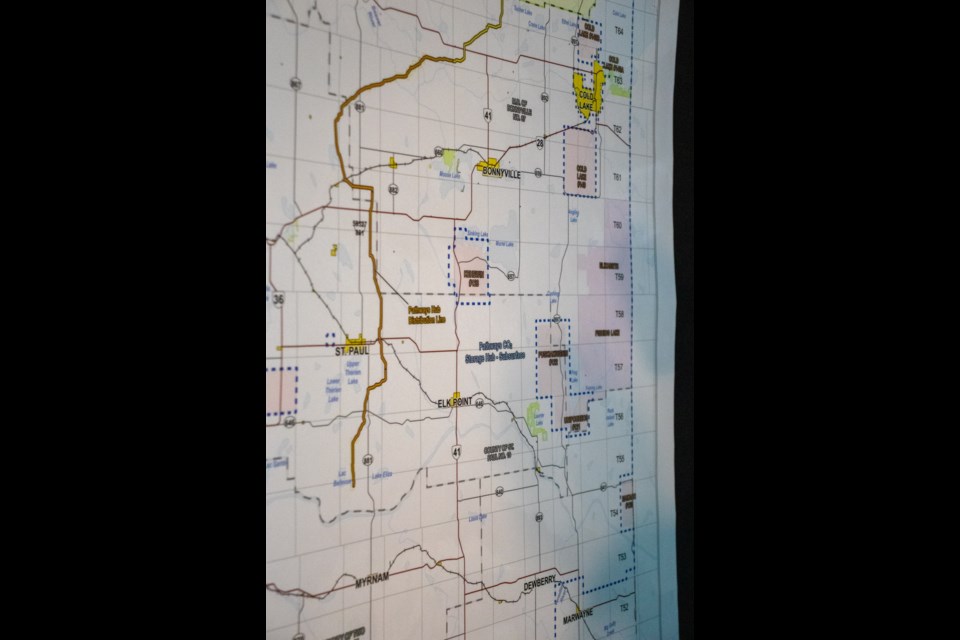 Indicated on the photo is a portion of the map detailing the transport line that is proposed to pass through the St. Paul-area.