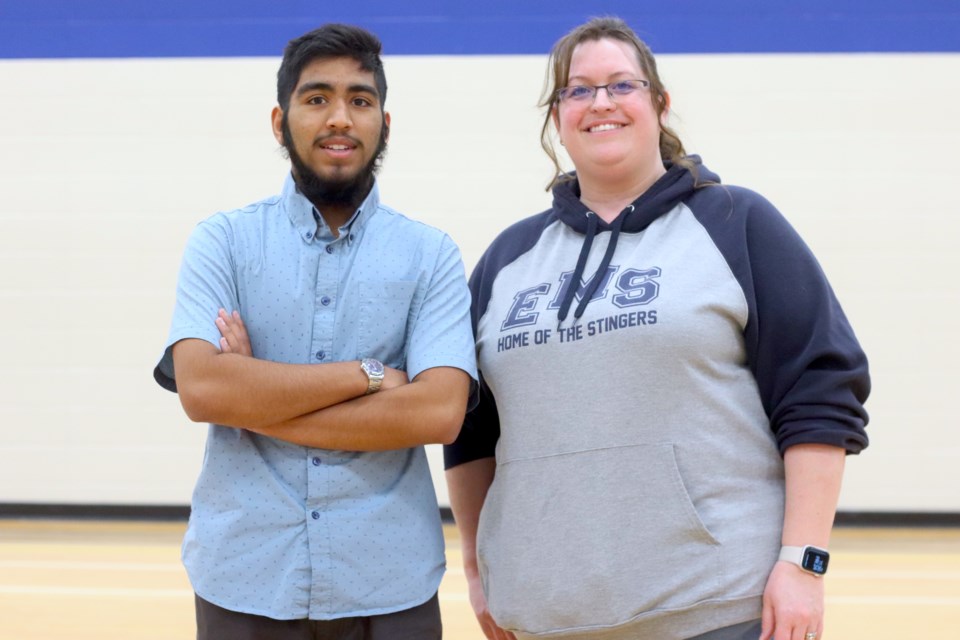 Burhanuddin Yamani poses for a photo with Mallaig School's principal Kellie Handford.