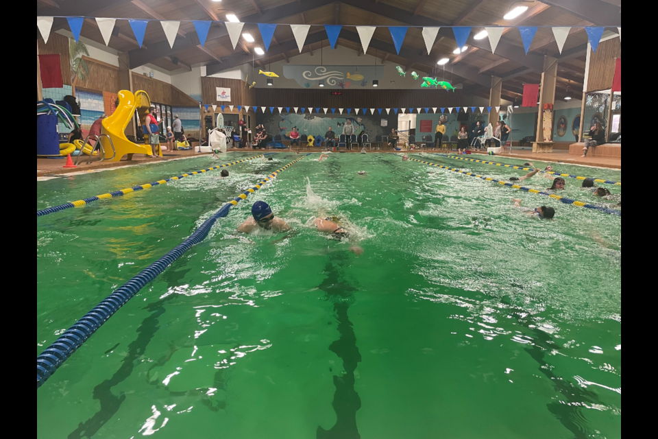 The cool water of the pool shimmered under the bright lights of the St. Paul Aquatic Centre as young swimmers from the St. Paul Barracudas Swim Club (SPBSC) swam as many laps as they could within two hours from 4 p.m. to 6 p.m. on Jan. 26. 