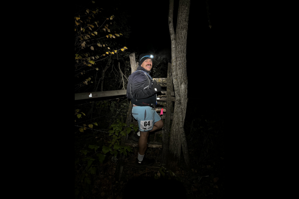 During the marathon, runners were also met with numerous obstacles, including some requiring them to climb. Pictured is John Zappitelli.