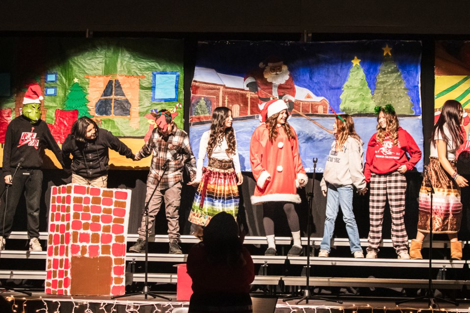 Drama 7 students perform a play of the Grinch.