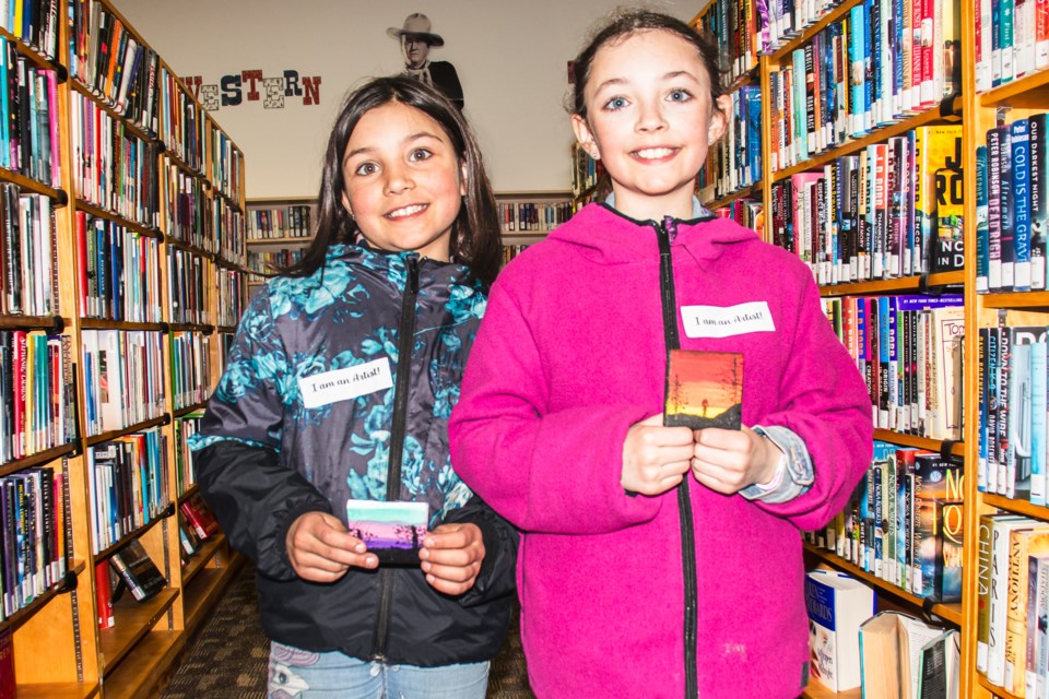 Adelaide (left) and Ophelia says they had fun painting their art.