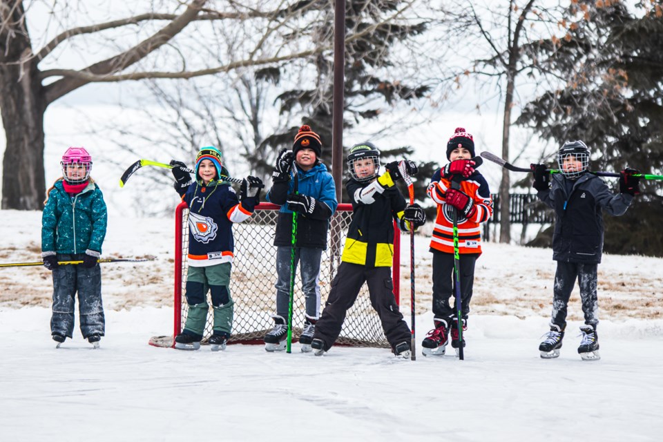 From left to right are Alessandra Ranger, Revy Jeffery, Kai Skyrpan, Taylor Ranger, Nova Jeffery, and Shae Skyrpan at Lagasse Park on Dec. 5, where they skated and played outdoor hockey.