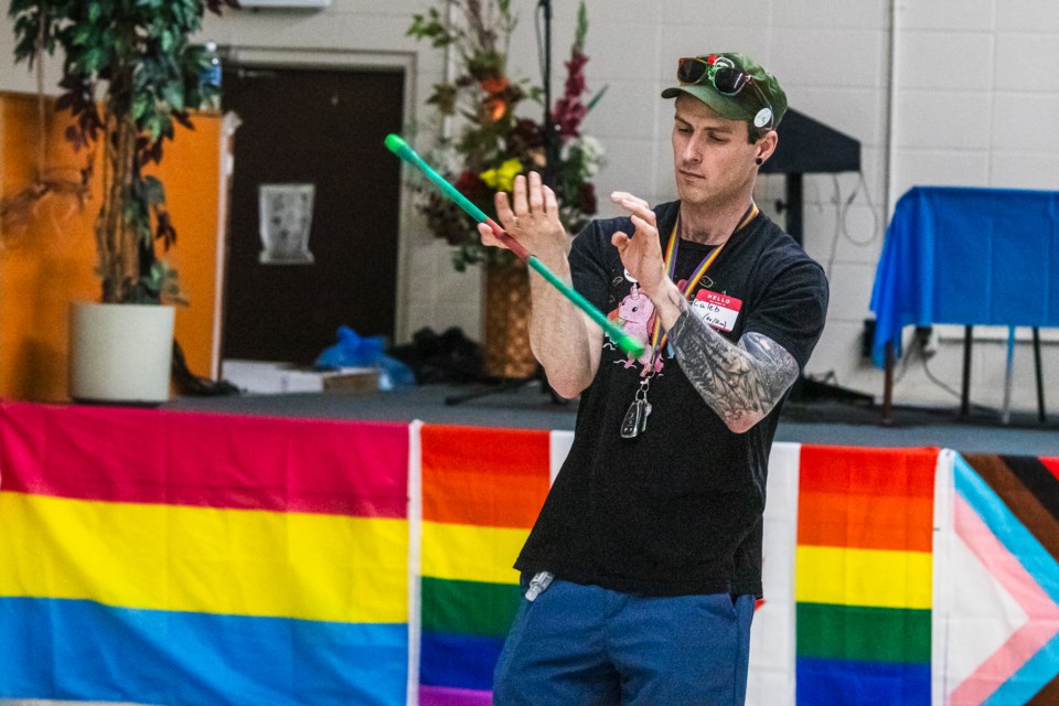 Caleb Anacker moves to the music during the Rainbow Rendezvous.