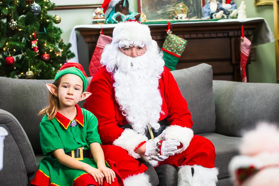 Snowflake the Elf and Santa spotted at the St. Paul Municipal Library on Dec. 16.