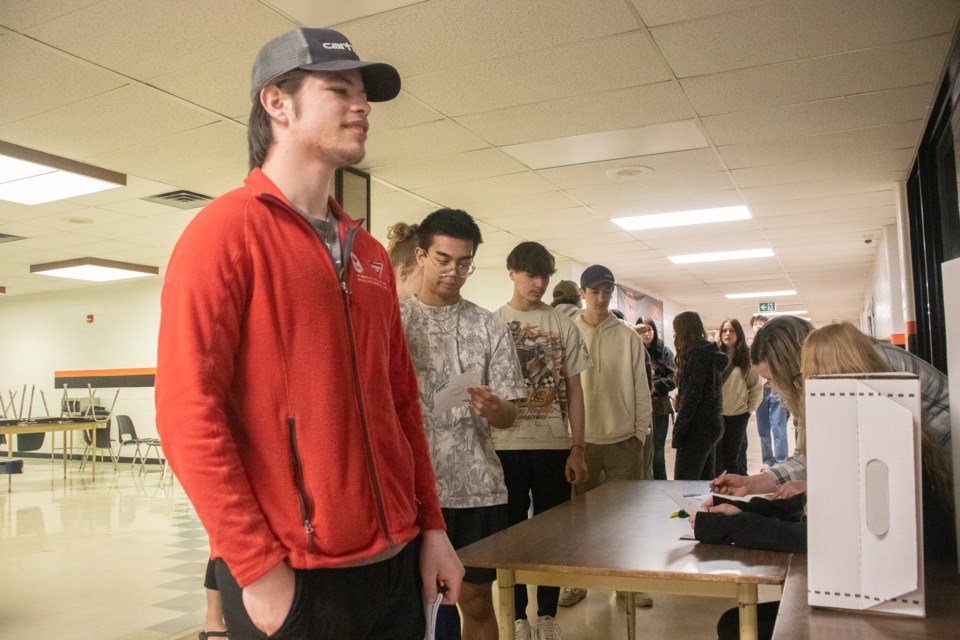 Students at the St. Paul Regional High School line up to take part in the Student Vote program.