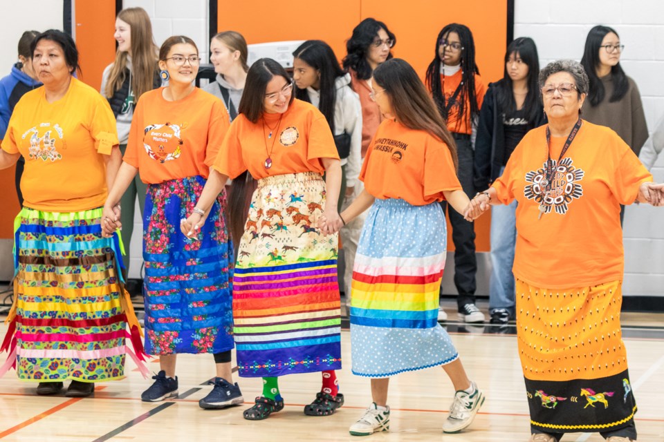 St. Paul Regional High School students and staff participate in a round dance during Orange Shirt Day on Sept. 30.
