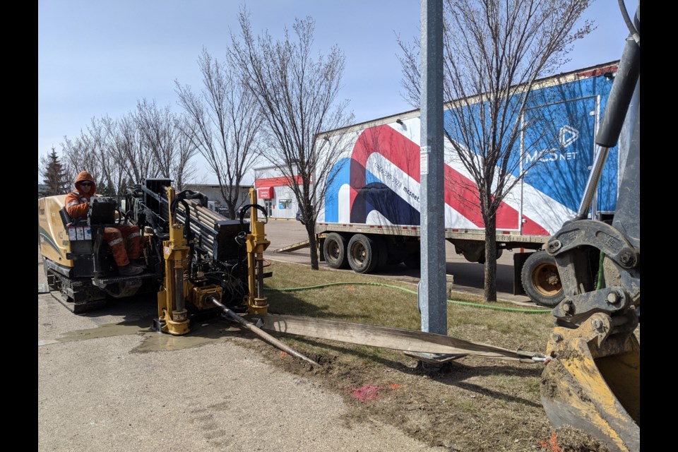 Above is a piece of equipment taken last year during the building of a fiber network in St. Paul by Buried Glass., a division of MCSnet. The construction of fiber network involves directional drilling and does not involve digging up any roads.