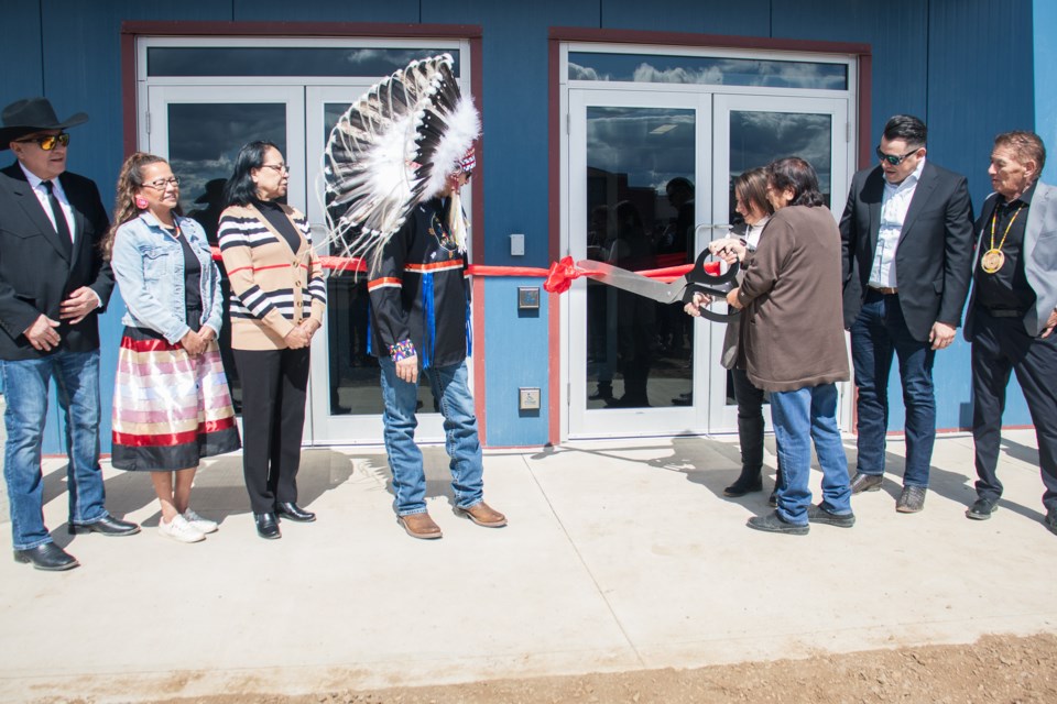 A ribbon cutting signaled the official opening of the new multiplex in Whitefish (Goodfish) Lake on April 24. Pictured are council members James Jackson Jr., Stephanie Jackson, Louise Hunter, Chief Herb Jackson, Lakeland MP Shannon Stubbs, Marjorie Memnook-White, Rennie Craig Houle and Rene Houle Sr.