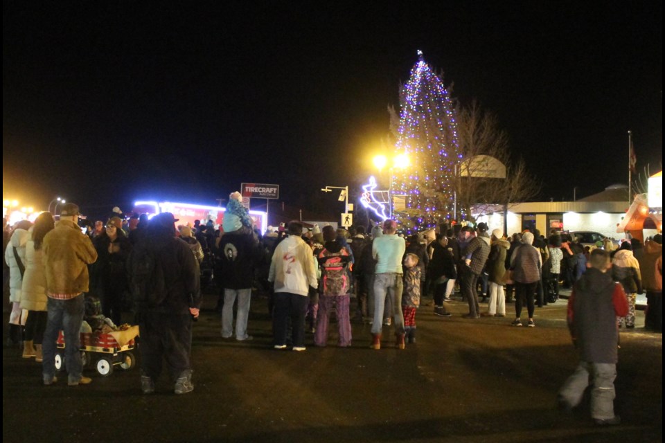 The big tree was lit with the flick of a switch by Junior Citizen of the Year Samantha Onciul.