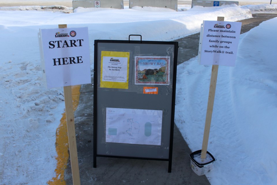 Families kicked off the StoryWalk at the front of the Bonnyville Municipal Library. Photo by Robynne Henry.