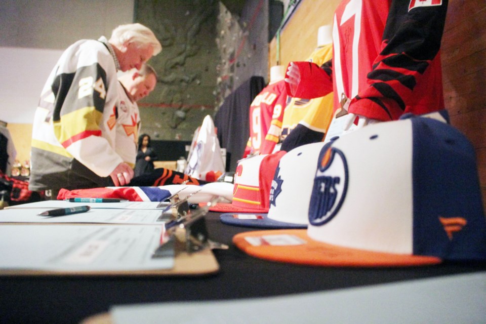There were lots of sport-themed items on the silent auction table at Friday night's Portage College Scholarship Fundraising night. 