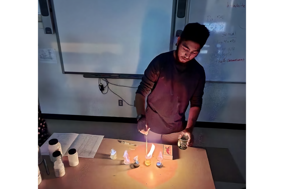 As the founder of a science club for Grade 3 and 4 students, Burhanuddin Yamani encourages a hands-on approach to exploring science with club members.