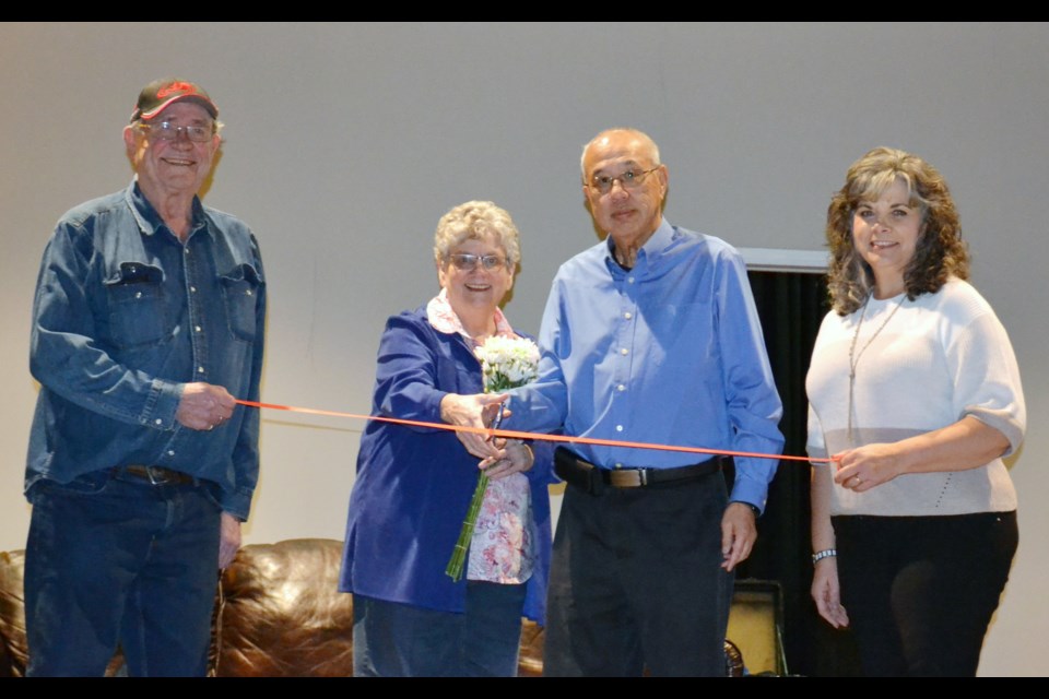 Elk Point Allied Arts Farmers Market manager RubyAnn Kittlitz and Mayor Parrish Tung snipped the ribbon held by Lavern Kittlitz and Deputy Mayor Wanda Cochrane to officially open the community’s first-ever official farmers market.