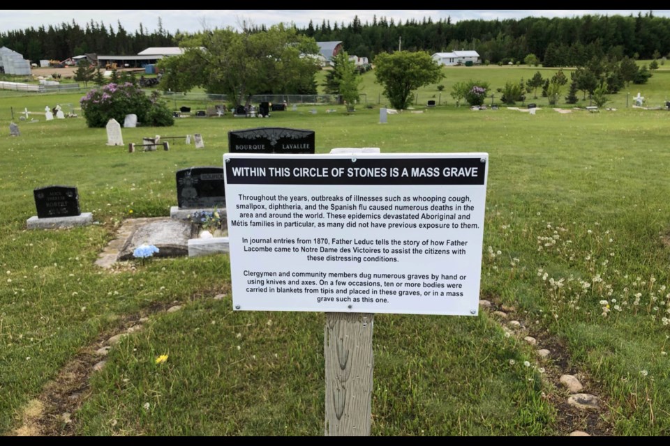 A sign at the Lac La Biche Mission was put up in recent years identifying a circular marking in the cemetery across from the current Mission site.