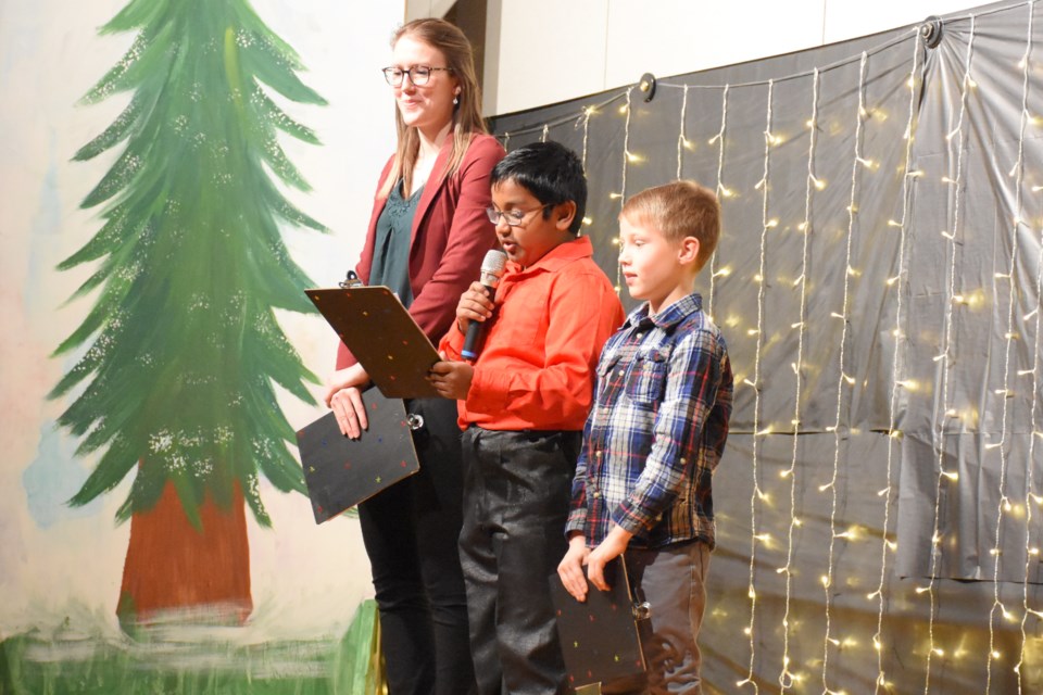 Principal Annie-Claude Leveille, with students Ishan Chatterjee and Rowan Kumpula, both who were hosts of the show.